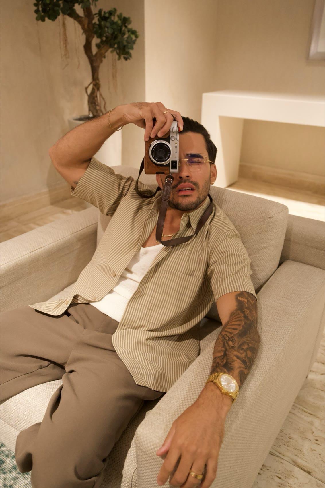 Jay Awal shooting content on camera